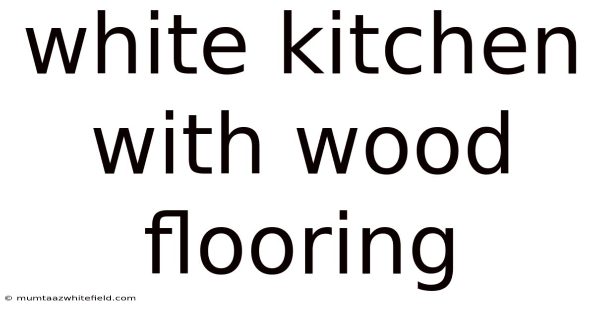 White Kitchen With Wood Flooring